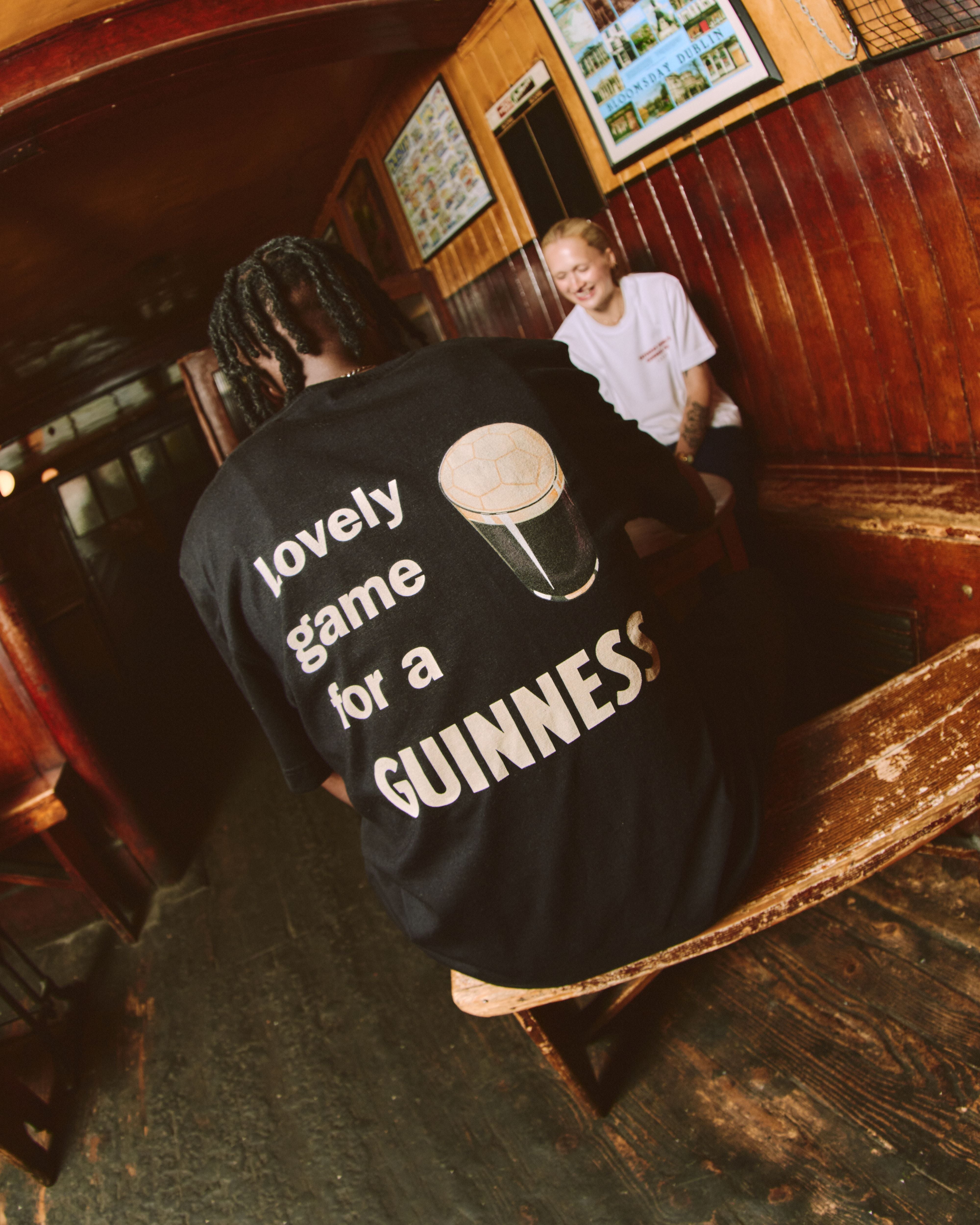 ART OF Lovely Game For A Guinness Tee | Black Graphic Football T-shirt