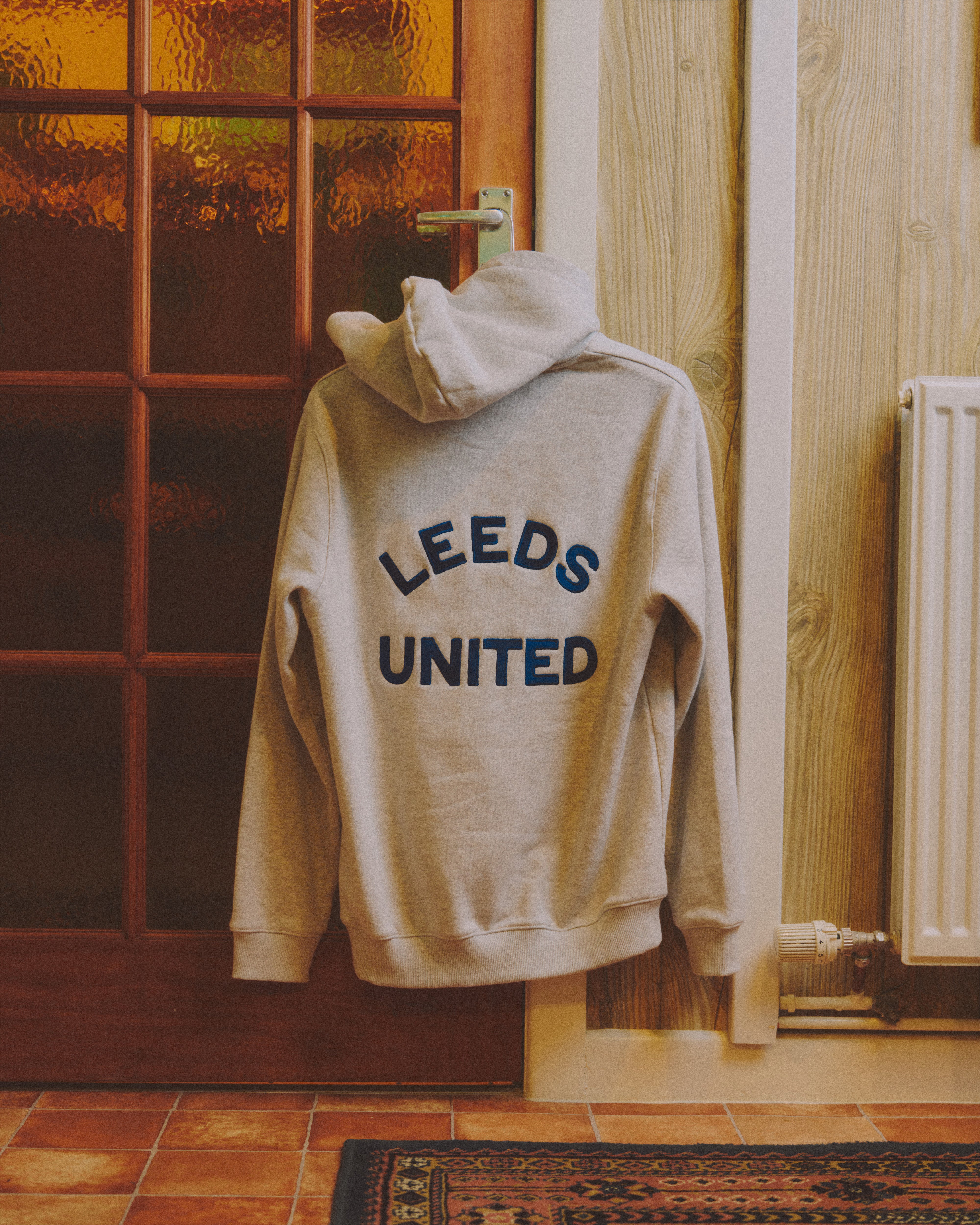 ART OF Football x Leeds United Smiley Embroidered Hoodie | AOF x LUFC